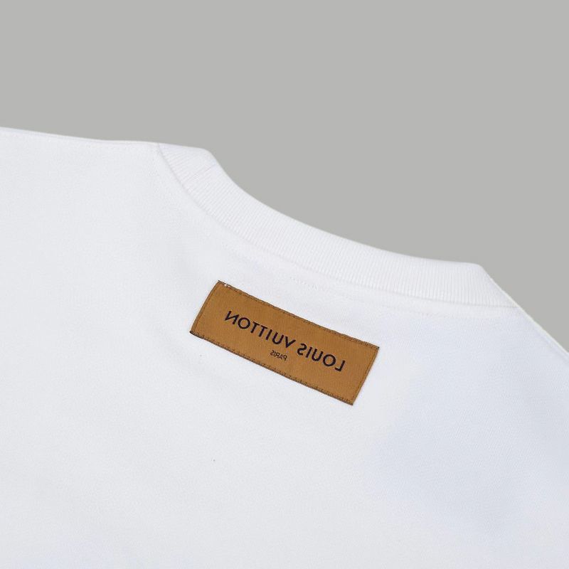 Full styled look of Louis Vuitton luxury clothing with tailored silhouette