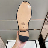 Side profile of Gucci soft grey sneakers chunky sole construction