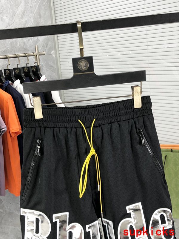 Close-up detail shot of Rhude luxury clothing with contemporary cut