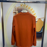 Side profile of Louis Vuitton luxury clothing with monogram-inspired silhouette