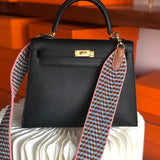 Side view of curated structured handbag