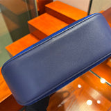 Side view of polished structured handbag