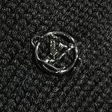 Flat lay presentation of Louis Vuitton luxury clothing with monogram-inspired silhouette