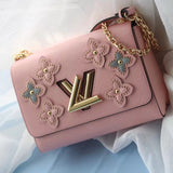 Side profile of premium sleek women's handbag – women's statement bag