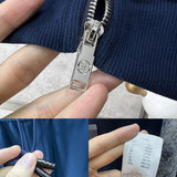 Flat lay presentation of Louis Vuitton luxury clothing with runway-inspired design