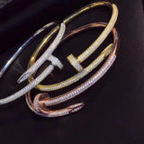 Front view of Cartier unisex jewelry piece