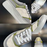 Side profile of Gucci crisp white sneakers retro runner design