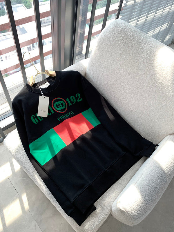 Flat lay presentation of Gucci luxury clothing with monogram-inspired silhouette