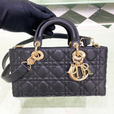 Handle and strap detail of elevated modern women's handbag – women's luxury accessory