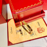 Close-up detail view of Cartier unisex jewelry piece