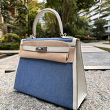 Side view of structured structured handbag