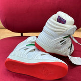 Side profile of Gucci stone beige sneakers classic court silhouette