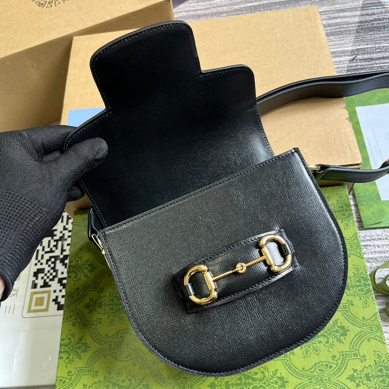Handle and strap detail of elevated statement women's handbag – women's luxury accessory