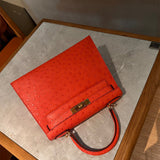 Side view of tailored structured handbag