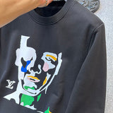 Flat lay presentation of Louis Vuitton luxury clothing with signature branding