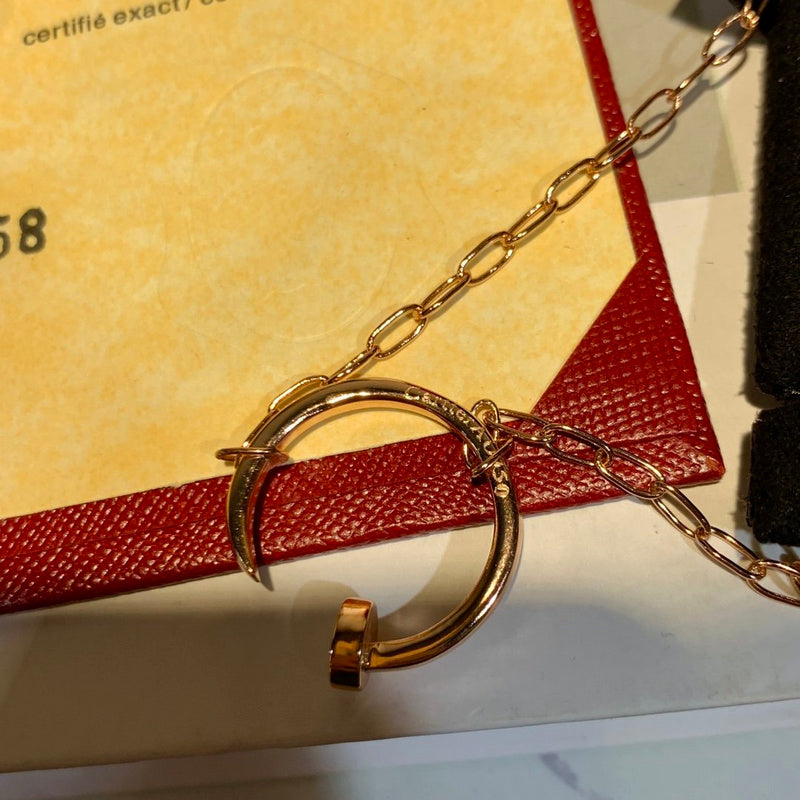 Side view of Cartier unisex jewelry piece