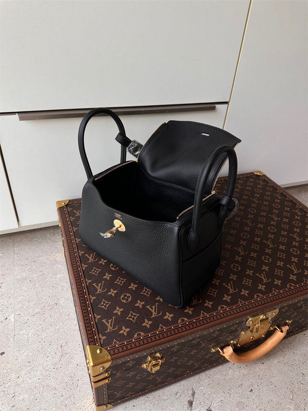 graceful top-handle bag detail view showing craftsmanship 14