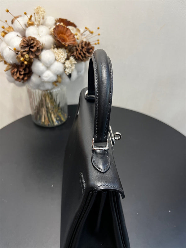 Side view of sophisticated structured handbag