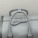 Styled lifestyle shot of everyday-luxe signature women's handbag – women's designer-style accessory