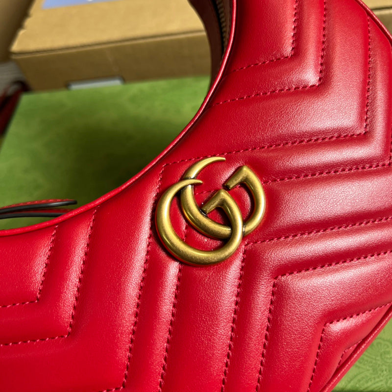 Side profile of polished signature women's handbag – women's luxury handbag