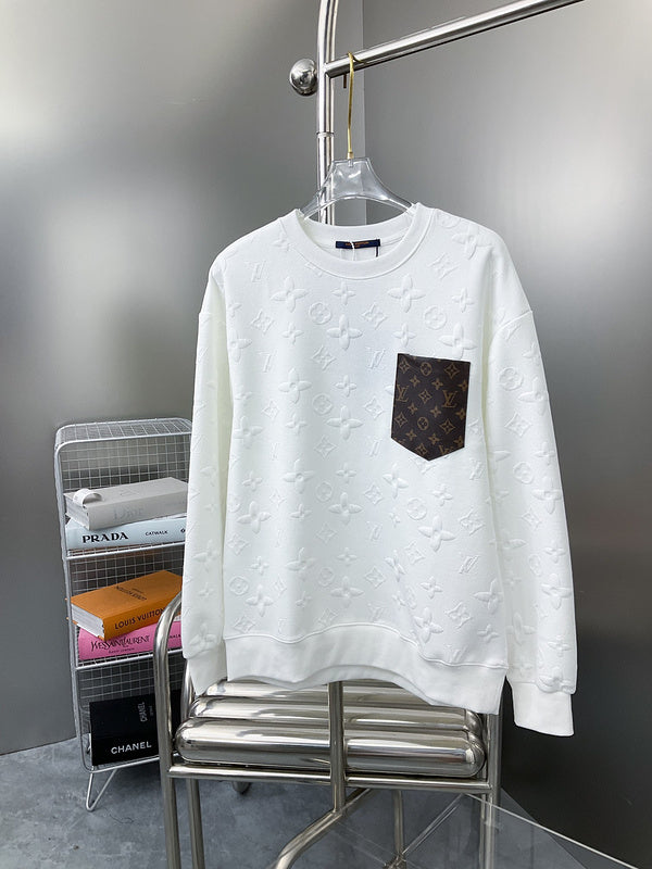 Back view of Louis Vuitton luxury clothing with label-forward styling