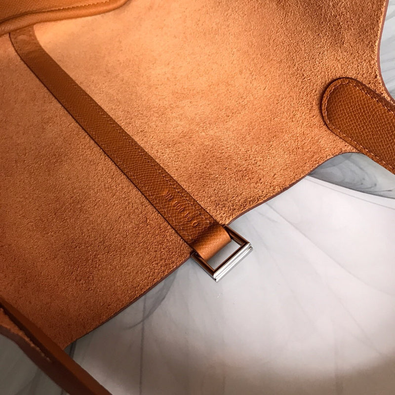 Side view of timeless structured handbag