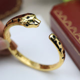 Side view of Cartier unisex jewelry piece