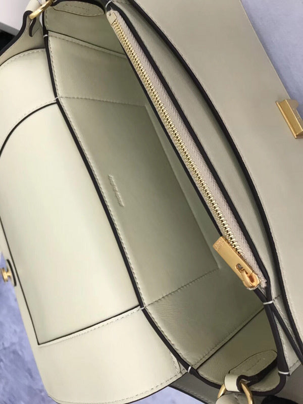 Side profile of refined elevated women's handbag – women's luxury handbag