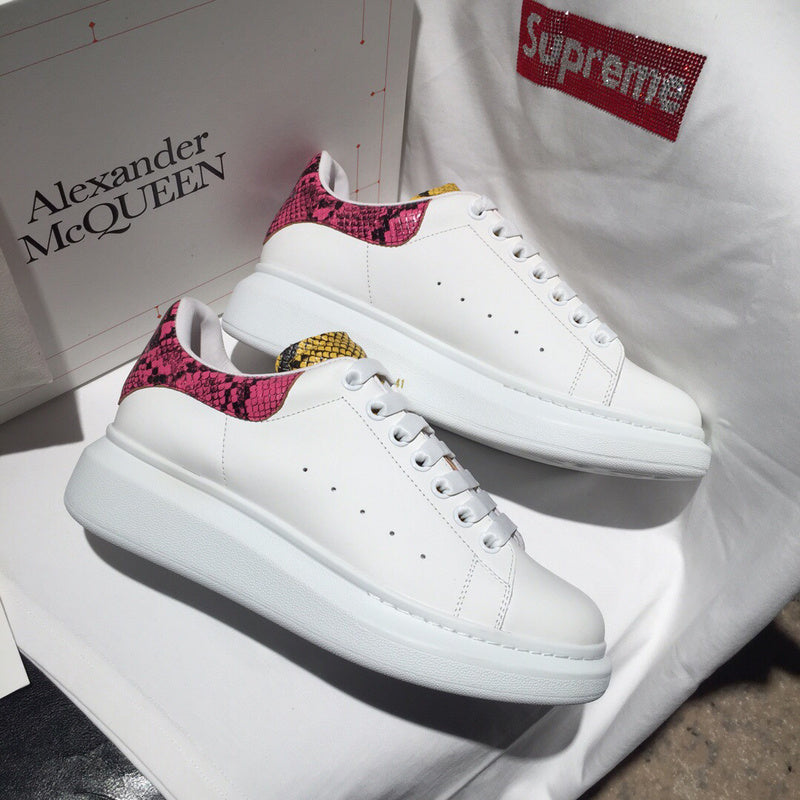 Alexander McQueen fresh white-and-black luxury sneakers view 6 signature lace-up style