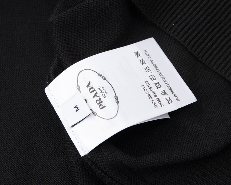 Close-up detail shot of Polo cotton polo shirt with monogram-inspired silhouette