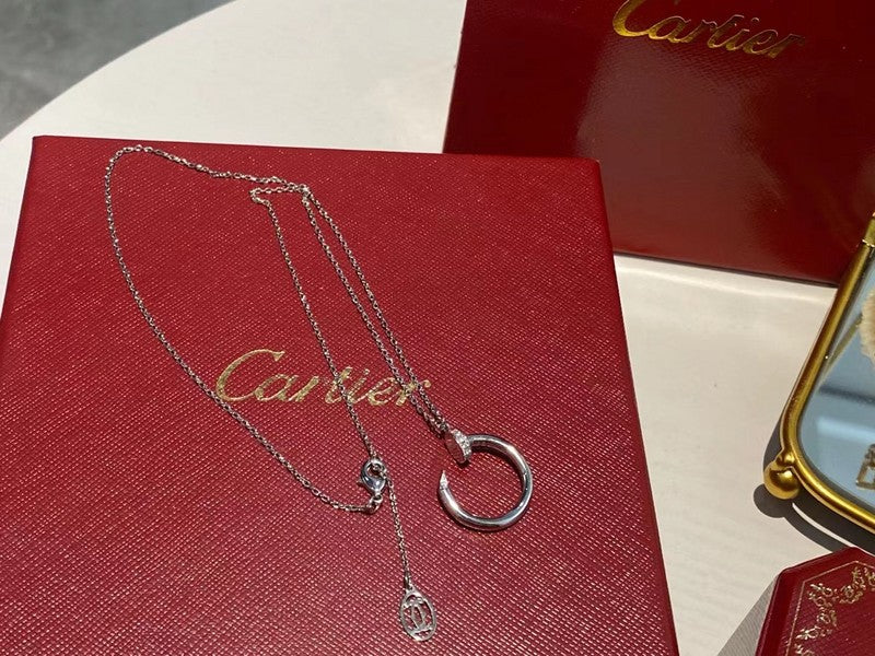 Close-up detail view of Cartier unisex jewelry piece