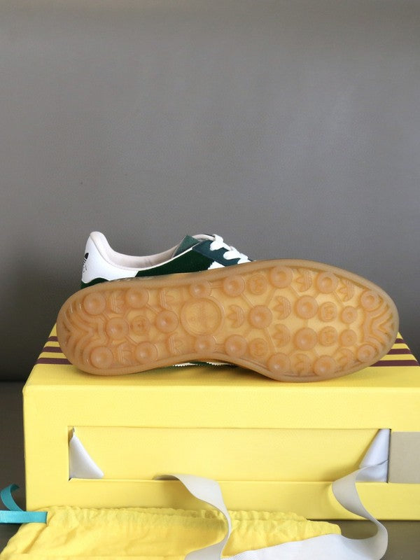 Side profile of Gucci muted earth tones sneakers heritage-inspired look