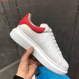 Alexander McQueen neutral cream luxury sneakers view 8 minimalist modern build