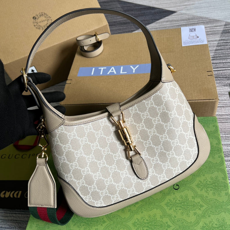 Front view of polished structured women's handbag – women's statement bag