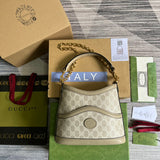 Side profile of signature refined women's handbag – women's luxury handbag