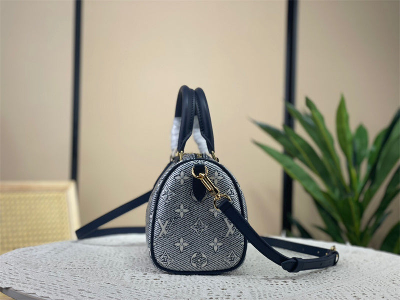  Clean-Lined top-handle bag carried on shoulder