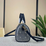  Clean-Lined top-handle bag carried on shoulder