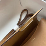 Side view of classic structured handbag