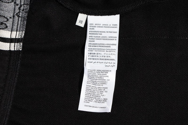 Close-up detail shot of Gucci luxury clothing with tailored silhouette