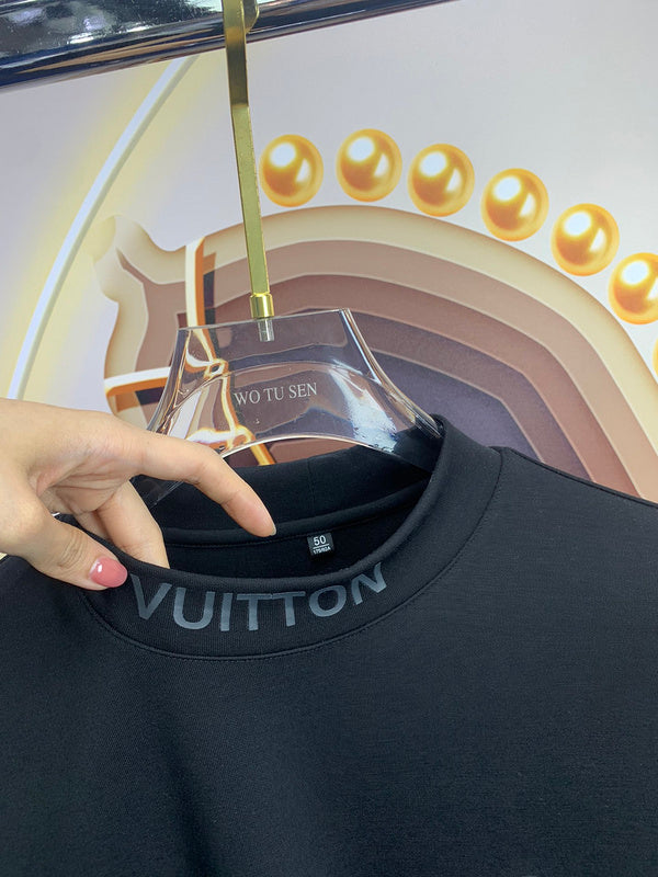 Flat lay presentation of Louis Vuitton luxury clothing with monogram-inspired silhouette