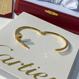 Front view of Cartier unisex jewelry piece