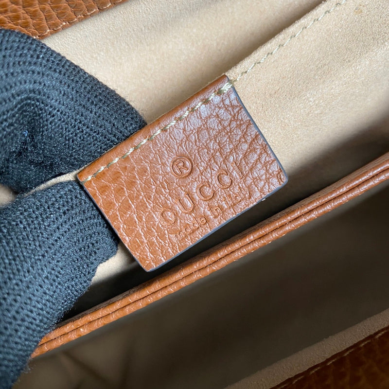 Side profile of everyday-luxe sleek women's handbag – women's designer-style accessory