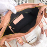 Side profile of chic structured women's handbag – women's everyday handbag
