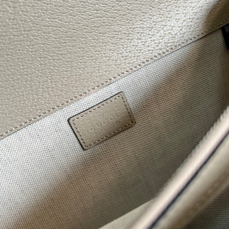 Side profile of elevated structured women's handbag – women's luxury handbag