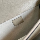 Side profile of elevated structured women's handbag – women's luxury handbag