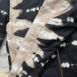 Side profile of Louis Vuitton luxury clothing with label-forward styling