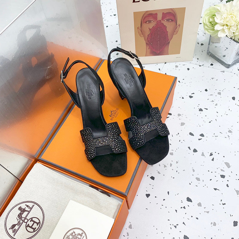 Hermès Grey Block Heel Sandals - Angled View