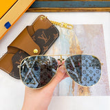 Lifestyle view of Louis Vuitton unisex sunglasses