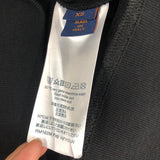 Side profile of Louis Vuitton luxury clothing with relaxed-fit cut