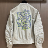 Side profile of Louis Vuitton luxury clothing with label-forward styling